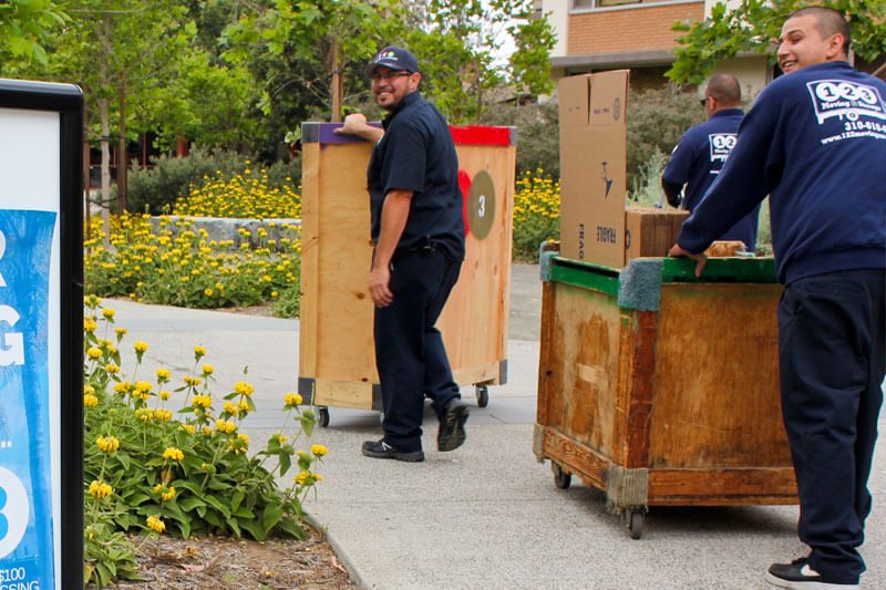 Movers moving students out of dorms